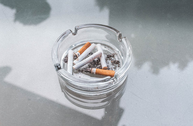 ashtray full of cigs